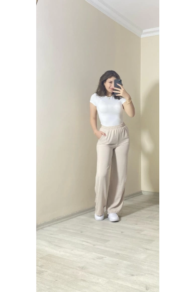 Yüksek Bel Beli Lastikli Bol Paça Pantolon – Taş Rengi