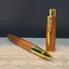 AsilTech Altın Şeritli Taba Deri Defter - Kahverengi Roller Kalem - Kutulu Özel Hediye Seti