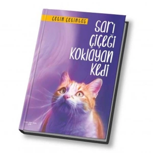 SARI ÇİÇEĞİ KOKLAYAN KEDİ