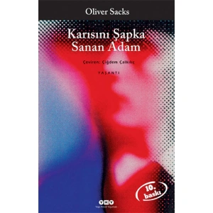 KARISINI ŞAPKA SANAN ADAM