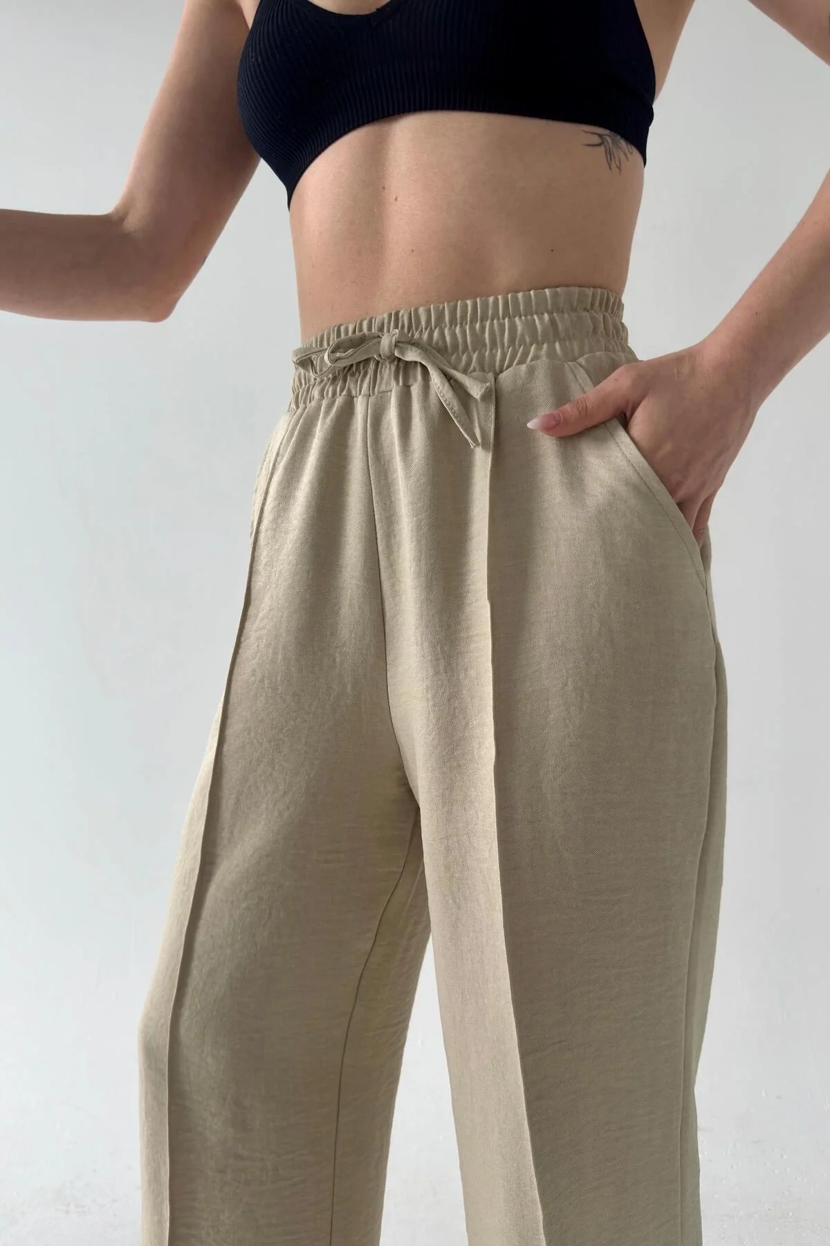 bysoca Kadın Bej Yüksek Bel Lastikli Bağcıklı Cepli Dökümlü Geniş Paça Palazzo Keten Pantolon