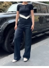 Kadın Bisiklet Yaka Asimetrik Kesim Atlet Detay Bluz Ve Yüksek Bel Bol Paça Pantolon Ikili Takım