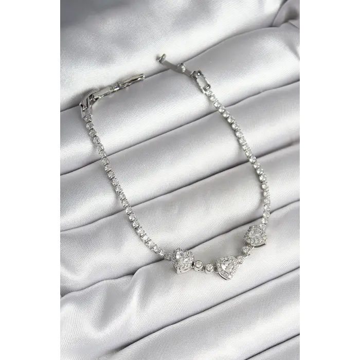 Pirinç Sıralı Kalp Figürlü Zirkon Taşlı Gümüş Renk Kadın Bileklik