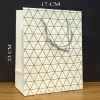 Beyaz Geometrik Desenli Orta Boy Karton Hediye Çantası