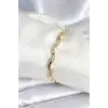 Pirinç Gold Renk Dalgalı Model Kadın Bileklik