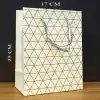 Beyaz Geometrik Desenli Orta Boy Karton Hediye Çantası