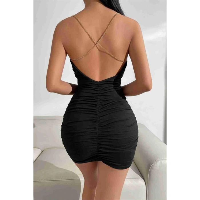 ÖZEL TASARIM  GÖGÜS DEGAJELI SIRT ZINCIR DETAYLI BÜZGÜLÜ SIYAH MINI CLUB ELBISESI