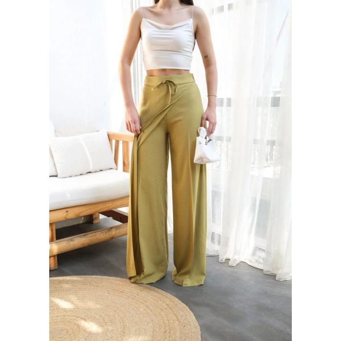 Keten Önü Çapraz Parçali asti̇kli̇ Ve Bağcikli Geni̇ş Paça Pantolon