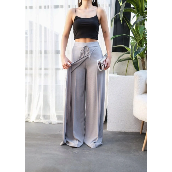 Keten Önü Çapraz Parçali Lasti̇kli̇ Ve Bağcikli Geni̇ş Paça Pantolon