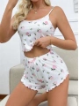 Beyaz Üstüne Gül Desenli Fitilli Askılı Şortlu Pijama Takımı