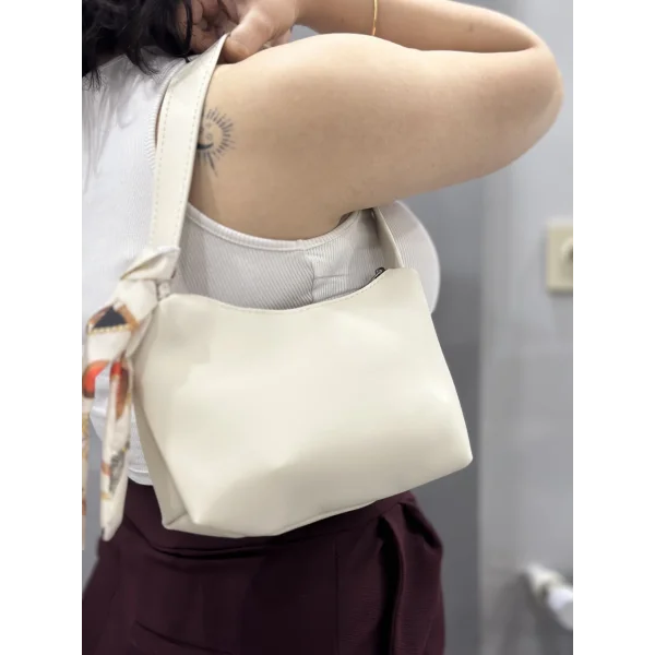 Riwan krem cilt çanta