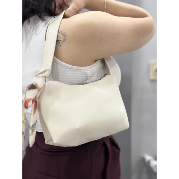 Riwan krem cilt çanta