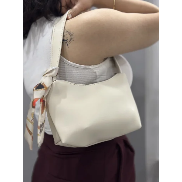 Riwan krem cilt çanta