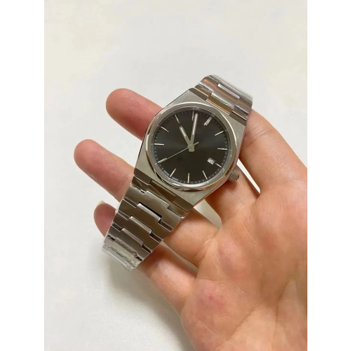 Gümüş Çelik Kordon Erkek Kol Saati Takvimli Siyah Kadran Özel Kutusunda