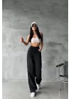 Arkadan tokalı jeans pantolon Siyah