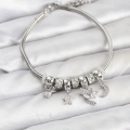BFS Pirinç Gümüş Renk Kalpli Model Charmlı Kadın Bileklik