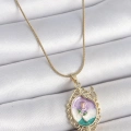 BFS 316L Çelik Gold Renk Zincir Mix Renk Mineli Çiçek İşlemeli Zirkon Taş Detaylı Portre Model Kadın Kolye