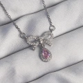 BFS 316L Çelik Gümüş Renk Fiyonk Detay Pembe Zirkon Taşlı Damla Kolye