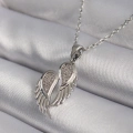 BFS 316L Çelik Gümüş Renk Zirkon Taşlı Kanat Model Kadın Kolye