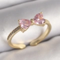 BFS Pirinç Gold Renk Pembe Zirkon Taşlı Kalp Fiyonk Model Kadın Yüzük