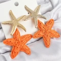 BFS Pirinç Sallantılı Turuncu Deniz Yıldızı Model Gold Renk Hasır Küpe