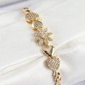 BFS Pirinç Zirkon Taşlı Kalp Detaylı Çiçek Model Gold Renk Kadın Bileklik