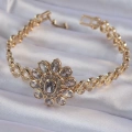 Pirinç Gold Renk İri Zirkon Taşlı Çiçek Figürlü Bileklik