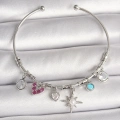 Pirinç Gümüş Renk Sallantı Zirkon Taşlı Kutup Yıldız Figür Kalp Detay Charm Kadın Bileklik