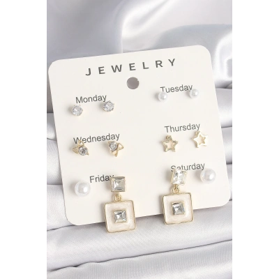 Pirinç Gold Renk Zirkon Taşlı Yıldız Figür Sallantı Beyaz Mineli Model 7Li Kadın Küpe Seti