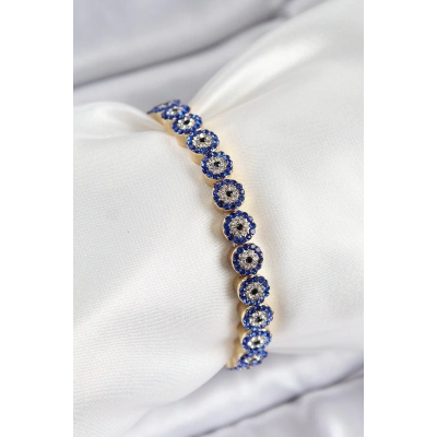 Pirinç Zirkon Taşlı Lacivert Nazar Model Gold Renk Lastikli Kadın Bileklik