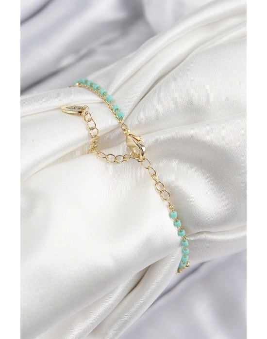 ® Pirinç Zirkon Taşlı Mavi Boncuklu Model Gold Renk Kadın Bileklik