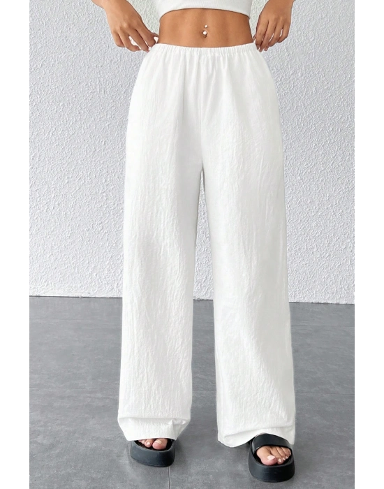Kadın Beyaz Bol Kesim Cepli Geniş Paça Dökümlü Pantolon