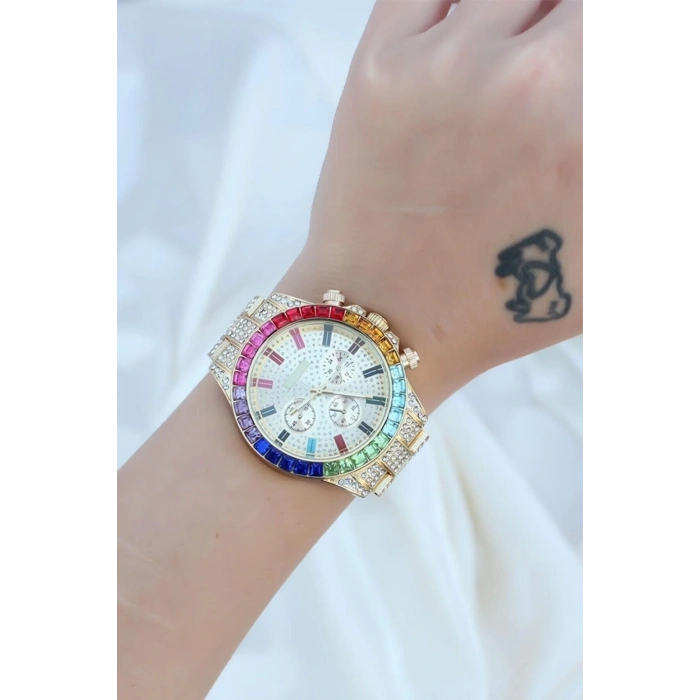ÇOK SATAN Clariss Trend Gold Metal Kordonlu Zirkon Taş Kaplama Renkli Taşlı Kasa Tasarımlı Lüx Kadın Kol Saati