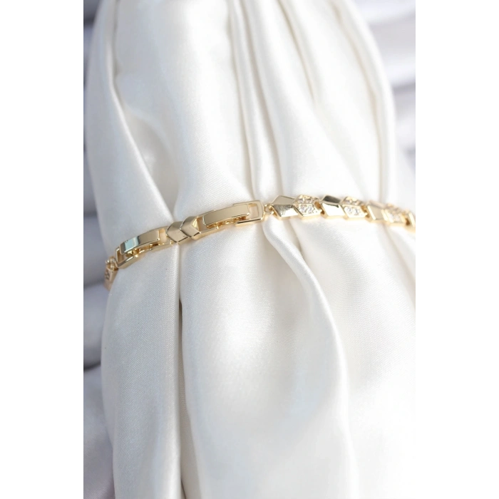 ÇOK SATAN Pirinç Gold Renk Zirkon Taşlı Balık Sırtı Model Kadın Bileklik