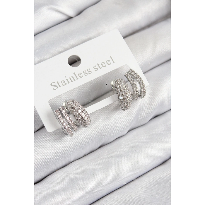 ÇOK SATAN Pirinç Zirkon Taşlı Kıvrımlı Model Gümüş Renk Kadın Küpe