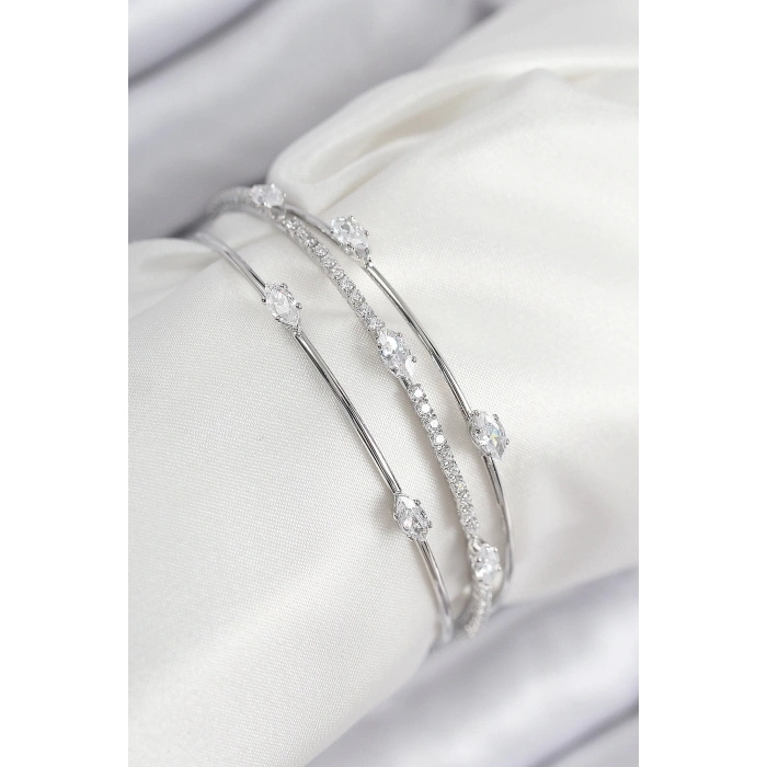 ÇOK SATAN Pirinç Zirkon Taşlı Su Yolu Model Gümüş Renk Kadın Bileklik