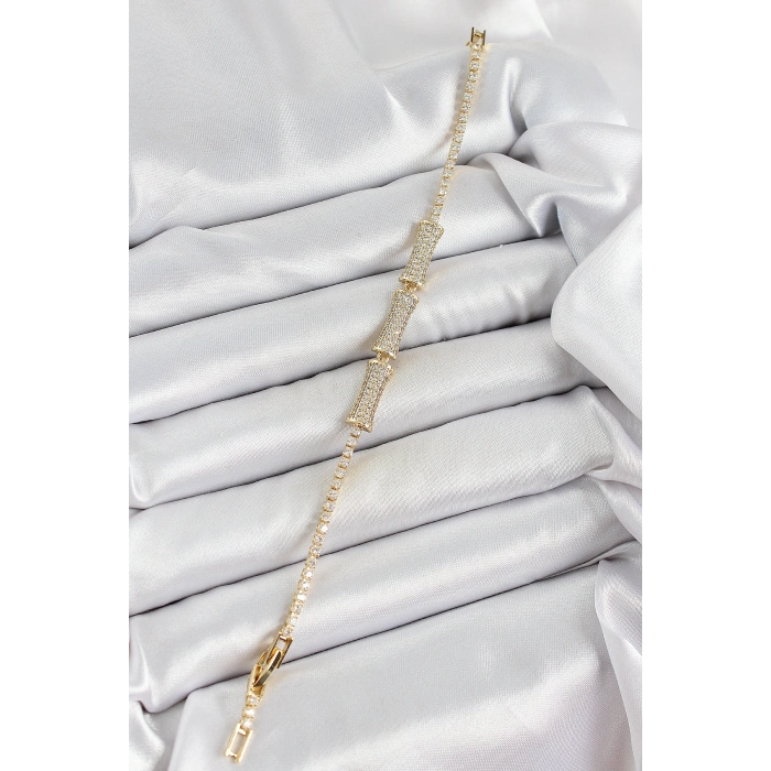 Pirinç Gold Renk Zirkon Taşlı Kemik Model Kadın Bileklik