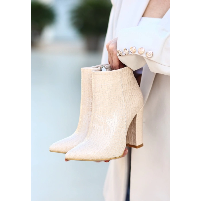 TAVSİYE EDİLEN GÜVENLİ SATICI Loora Ten Rugan Desenli Topuklu Bot