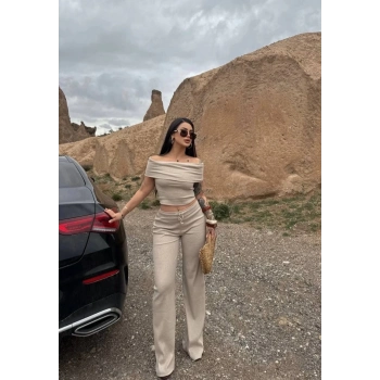 TAVSİYE EDİLEN GÜVENLİ SATICI Madonna yaka bol paça pantolonlu takım