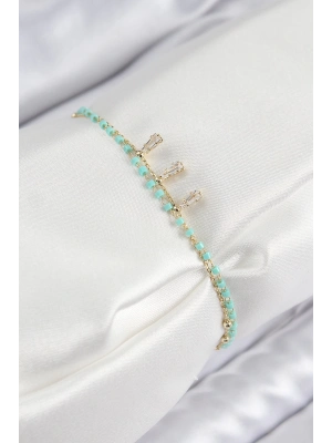 ® Pirinç Zirkon Taşlı Mavi Boncuklu Model Gold Renk Kadın Bileklik