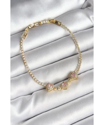 Pirinç Sıralı Pembe Kalp Figürlü Zirkon Taşlı Gold Renk Kadın Bileklik