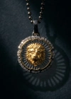 Two Color Coated Lion Openwork Medallion Necklace with Stone Edges