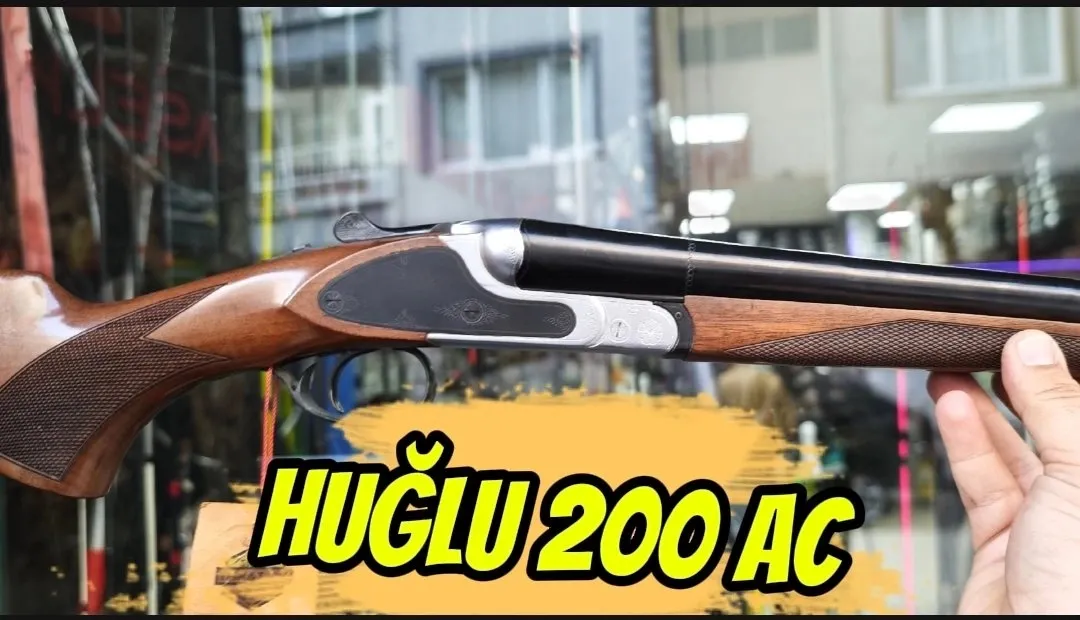 Huğlu 200AC Çifte Av Tüfeği (12 GA & 20 GA - Dövme Çelik Kasa - Kabartma & El Oyması Gravürlü - Seçilmiş Türk Cevizi)