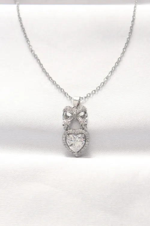ietaks™ 316L Çelik Silver Renk Zirkon Taşlı Kalpli Fiyonk Kolye