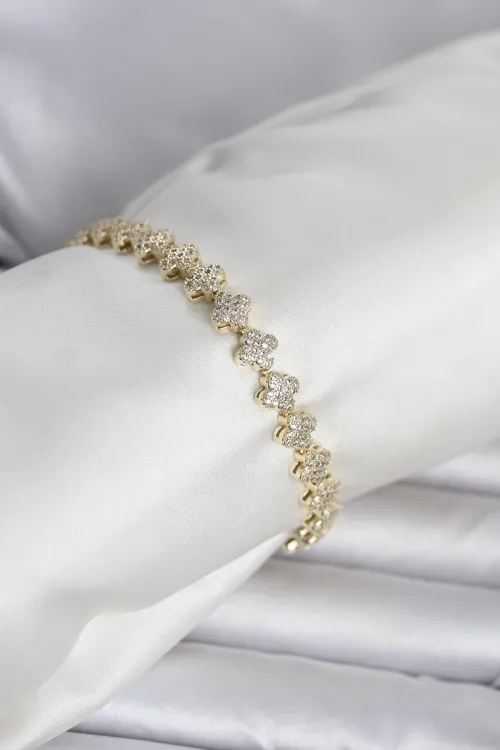 ietaks™ Pirinç Gold Renk Yonca Model Sıralı Zirkon Taşlı Kadın Bileklik