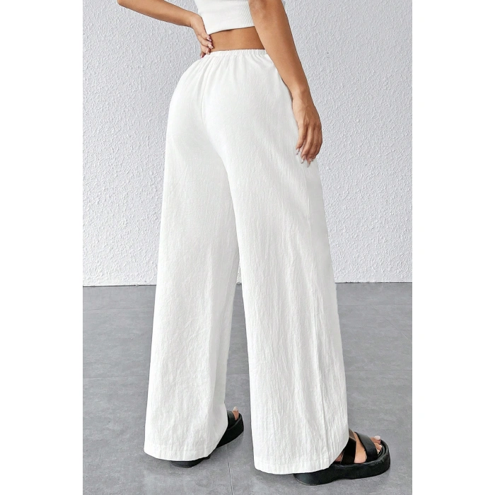 Kadın Beyaz Bol Kesim Cepli Geniş Paça Dökümlü Pantolon