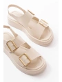1187 Bej Dolgu Topuk Lastik Baretli  Kadın Sandalet