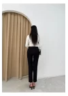 Kadın Siyah Kemerli Dar Paça Pantolon – Şıklığın Ve Rahatlığın Buluşması!