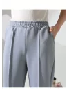 Kadın Yüksek Bel Lastikli Düz Renk Cepli Çizgili Bilek Boy Scuba Kumaş Jogger Pantolon