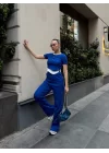 Kadın Bisiklet Yaka Asimetrik Kesim Atlet Detay Bluz Ve Yüksek Bel Bol Paça Pantolon Ikili Takım